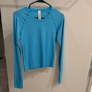 Swiftly tech long sleeve waist length